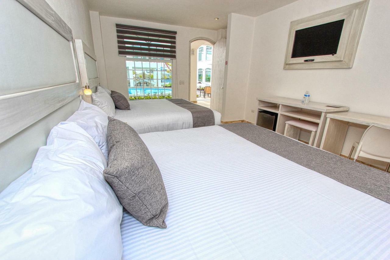 סאן מיגל דה אלנדה Hotel Splash Inn מראה חיצוני תמונה